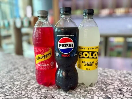 600ml Schweppes Raspberry, Pepsi Max and Solo Lemon soft-drink bottles